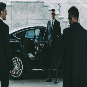 PNWL Chauffeur Holding Door Open For Client